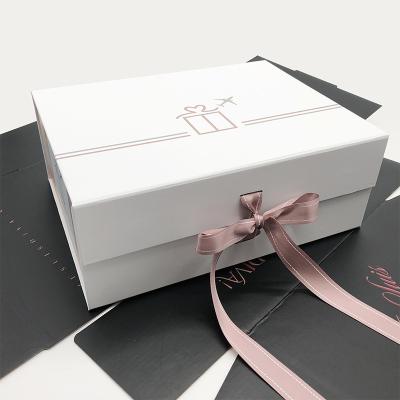 China Hot Custom Logo Large Cardboard Magnetic Lid Fold Ribbon Gift Wrapping Paper Rigid White Box Recyclable for sale