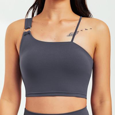 China Private Label Breathable Sexy Women Nude Recycled Nylon One Shoulder Sports Bra For Yoga Suit Activewear for sale