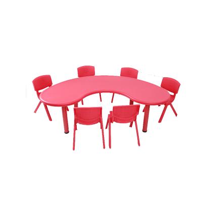 China Indoor half moon shape plastic kids red color plastic study table for sale for sale