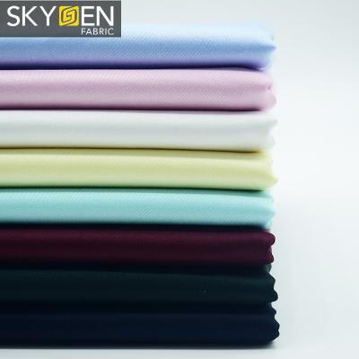 China Wholesale Skygen Solid Color 60s Cotton 60s Satin Customized Anti-static Silky Combed 100% Fabric For Shirt Dress for sale