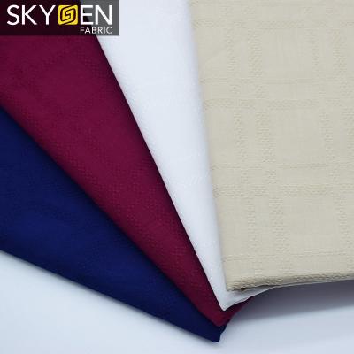 China Anti-Static Ready Running Hot 100% Canvas Fabric For Sale Cotton Solid Color Dobby Shirts for sale