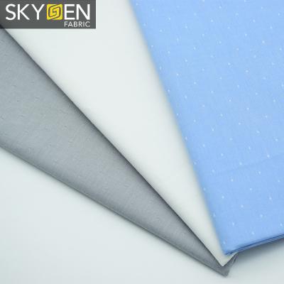 China Hot Sale Anti-Static 100% Cotton Yarn Dyed Solid Color Dobby Men's Shirting Fabric for sale