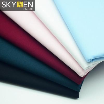 China Wholesale Classic Anti Static Dyed Silky Solid Color Cotton Stretch Twill Shirt Fabric for sale