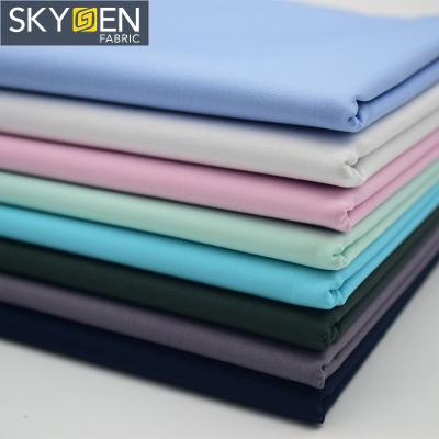 China Wholesale Custom Anti-static Solid Color Cotton 125gsm 100 Skygen Blue Pink White Cotton Fabric for sale