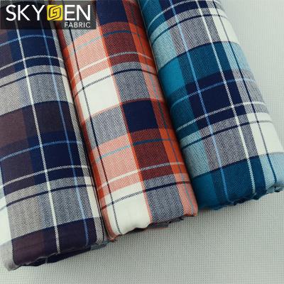 China Factory direct sale Skygen tartan plaid flannel fabric large custom anti-static control herringbone design red blue for sale