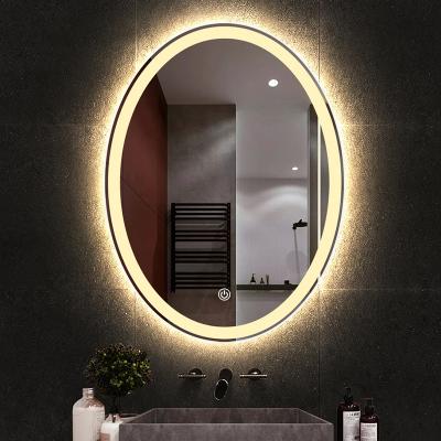 China Oval Shape Backlit Mirror Wall Mounted Decorative LED Illuminated Smart Touch Screen Lighted Bathroom Mirror for sale