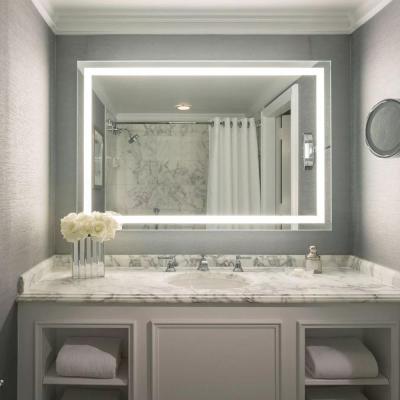 China Hotel Bathroom Smart LED Magnifying Modern Luxury Frameless Vanity Mirror With Anti-fog Device for sale