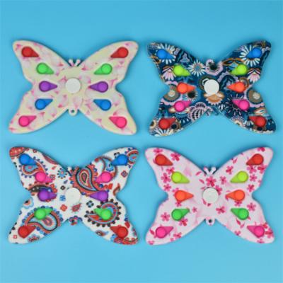 China Promotion AA084 Promotion Trigger Press Hand Butterfly Flying Restless Spinner Push Bubble Antistress Spiner Game for sale