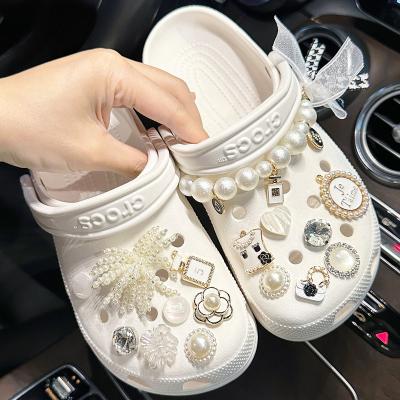 China Custom Designer Inspired Luxuryhoe Charms Designer Shoe Charms For Sneakers Shoe Patch Clog Charm for sale