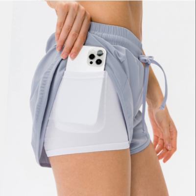 China Breathable 2 High Elasticity Women In Sports 1 Running Tennis Shorts Workout Gym Yoga Sport Shorts For Women With Phone Pockets for sale