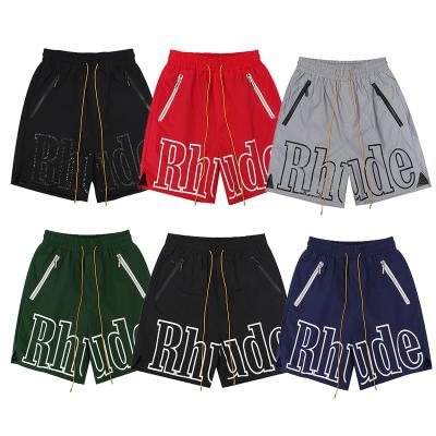 China Highest Quality Rhude Sports Letter Metal Printing Pocket Zipper QUICK DRY Reflective High Street Men's Shorts Quick Dry Warm Pants for sale