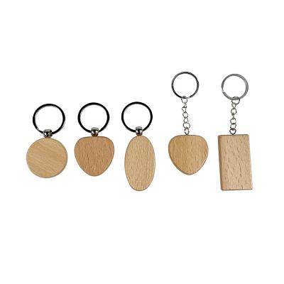 China Eco-Freindly Exquisite Creative Various Natural Pine Color Wooden Key Chain Custom Logo for sale