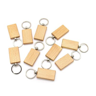 China Eco-Freindly Sale Exquisite Creative Pine Various Color Natural Pearl Engraved Custom Made Wooden Key Chains for sale