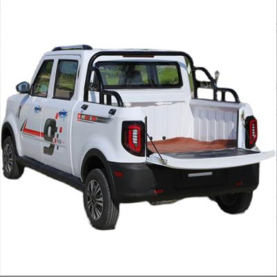 China Stamping iron shell long cruising range 60-120 kilometers 2000w power rear drive cargo pickup electric four wheel disc brake can hold 4 people for sale