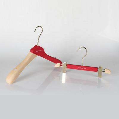 China Eco-friendly Material Advanced Custom Coat Hangers Solid Wood Wooden Pants Hanger With Clips For Clothes for sale