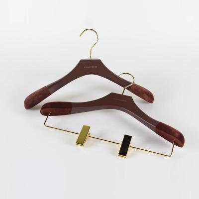 China Eco-friendly Material Natural Solid Wooden Hangers KABEEN Suits Manufactures Wooden Hangers Velvet Shoulder for sale