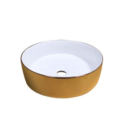 China Modern Manufacturer Bathroom Ceramic Countertop Table Top Wash Art Basin Round Shape Bathroom Sink Sinks Gold for sale