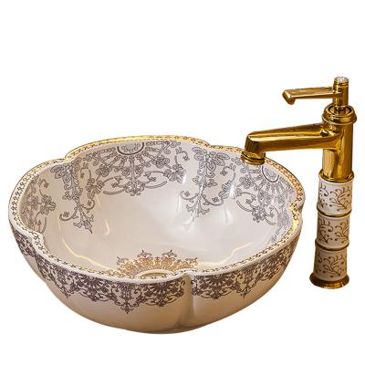 China 2020 Contemporary New Hot Sale Cheap Shell Shaped Gold Plated Counter Above Ceramic Bathroom Sink Sink for sale