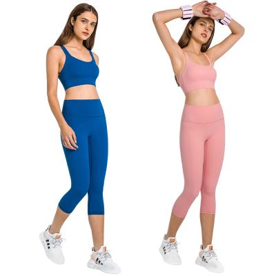 China Breathable Wholesale Workout 2 Piece Active Wear Sports Bra And Shorts Legging Sets Solid Printed Womens Yoga Sets for sale