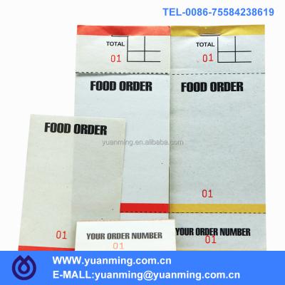 China Bar Food Order Pads 50gsm Customizable Stripped Newsprint Paper With 3 Positions Of Serial Numbers And Two Perforated Lines On Each UK Sheet for sale