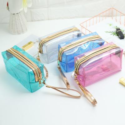 China Multi-function Laser Travel Bling Bag Cosmetic Makeup Brush Case Organizador De Maquillaje Zipper Transparent Portable Clear Toiletry Bag Cosmetic Bag for sale