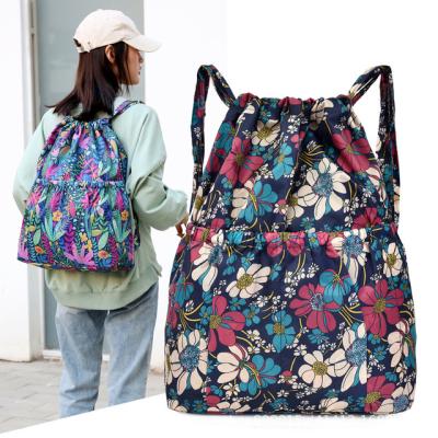 China 2021 Floral Fabric Backpack To Hochwertige Tasche Of Oxford Women's Fashion Backpack Waterproof Warm Drawstring Travel for sale