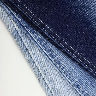 China Shrink-Resistant Stock Lot Rolls 10.6oz Blue Jeans Fabric Yards Net Denim Fabric Price Denim Fabric for sale