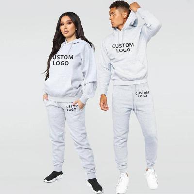 China Custom Fashionable Windproof Hooded Luxury Breathable Unisex Solid Color Sweatsuit Logo 2 Piece Sweatsuit With Pocket for sale