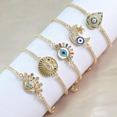 China FASHIONABLE Rainbow Zircon Bracelet Evil CZ Hamsa Hand Watches Bracelet For Women for sale