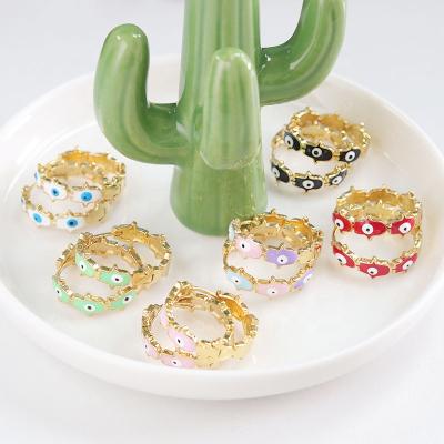 China Romantic Colorful Enamel Hand Palm Enamel Eyes Earrings Shape Circle Earrings for sale