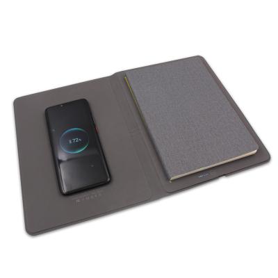 China New Design Ultrathin Phone Charging Portable Notebook With Wireless Fast Charger Power Bank Diary Planner Gifts for sale