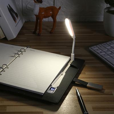 China Customized Notebook Lighting With Wireless Power Bank 8000mah Charging Lamp Powerbank Notebooks for sale