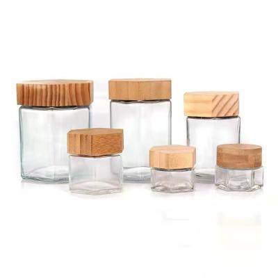 China Food Industry Factory Wholesale 30ml 80ml 180ml 280ml 380ml Hexagon Glass Jar With Wooden Lid for sale