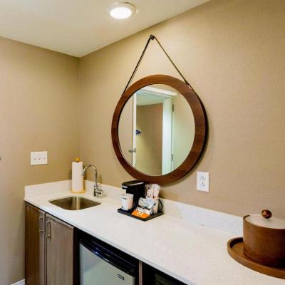 China Contemporary log framed mirror with hanging and decorative rope above wet bar in Hampton Inn and suites for sale