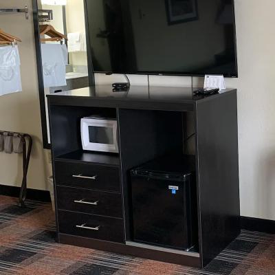 China Traditional TV stand furniture with microwave and minifridge cupboard in Baymont by Wyndham Hotel for sale