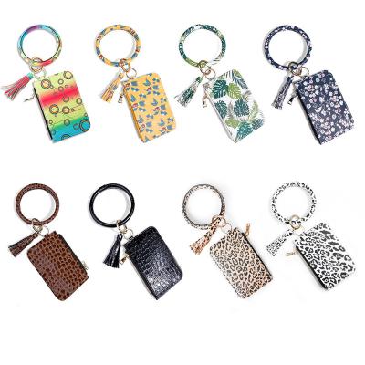 China 2022 New 2022 Key Chain PU Coin Purse Card Case Leather Keychain Anti-lost Wristband Pendant Female Wallet Car Anti-theft for sale