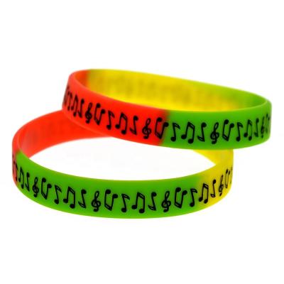 China For Promotion XMZJ Promotion Mix Color Wholesale Custom Band With Filling Color LOGO Debossed Silicone Wristbands for sale