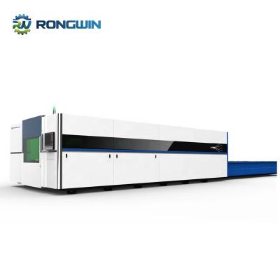 China Laser CUTTING Enclosed type interchange table high quality dual drive fiber laser cutting machine for sale