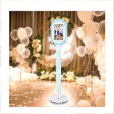 China Photo booth cheap fashion portable party dslr led photobooth rotating magic box sharing station ipad photo booth stand machine with printer for sale