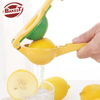 China Sustainable Luxury Yellow And Green Juice Fruits Extractor Household Orange Aluminum Alloy 2022 Hand Squeezer Lemon Kitchen Instruments for sale