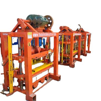 China Building Material Shops QT4-40 Manual fly ash concrete interlocking China Building Cement Hollow Concrete Brick Making machine for sale