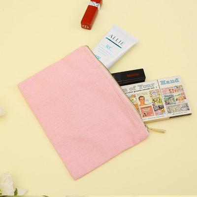 China Luxury Logo Fashion Gold Canvas Zipper Makeup Brush Pouch Reusable Custom Cosmetic Case Travel Makeup Bag for sale