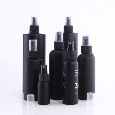 China 30ml 100ml 150ml 200ml Cosmetic Shape Screen Printing Matte Black PET Plastic Spray Bottle for sale