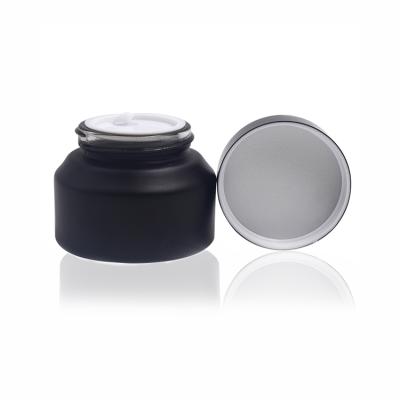 China Premium 50g opaque matte black glass jar with black lid 15g 30g 100g cometic glass jars for cream for sale