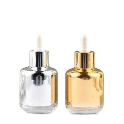 China Luxury premium empty glass dropper cosmetic essential oil bottle with packaging case for sale