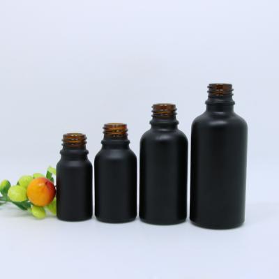 China Shunpai Ready To Ship Cosmetic Matte Black Frosted Glass Round Shape Essential Oil Dropper Bottle for sale