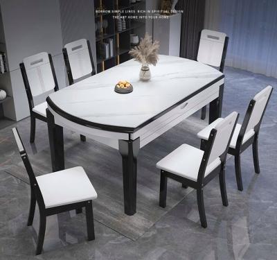 China Extendable Black and White Wooden Round Dining Table 6 Seater for sale