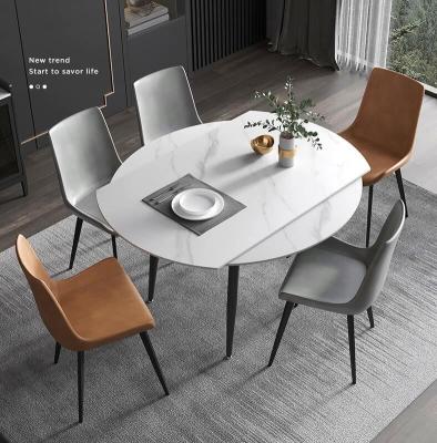 China Modern Marble Extendable Round Dining Table and Chairs Set White Color Home Dining Room Furniture for sale