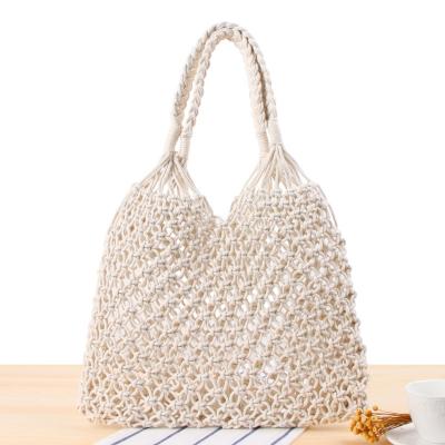 China Simple lady solid color new shoulder woven bag female straw woven bag female straw woven bag cotton handmade rope beach bag for sale