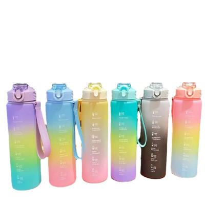 China Large Capacity Gradient Colorful Water Bottle Frosted Sports Water Bottle Portable Handle Beverage Car Cup 1000ml Direct Bounce Cup for sale